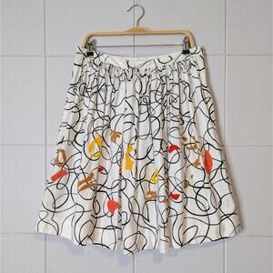 Anthropologie Maeve shape swirl embroidered cotton poplin circle skirt